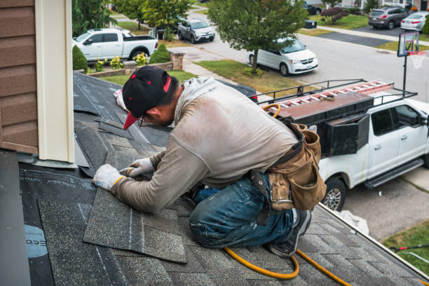 Professional Roofing technician working in Floral Park, NY